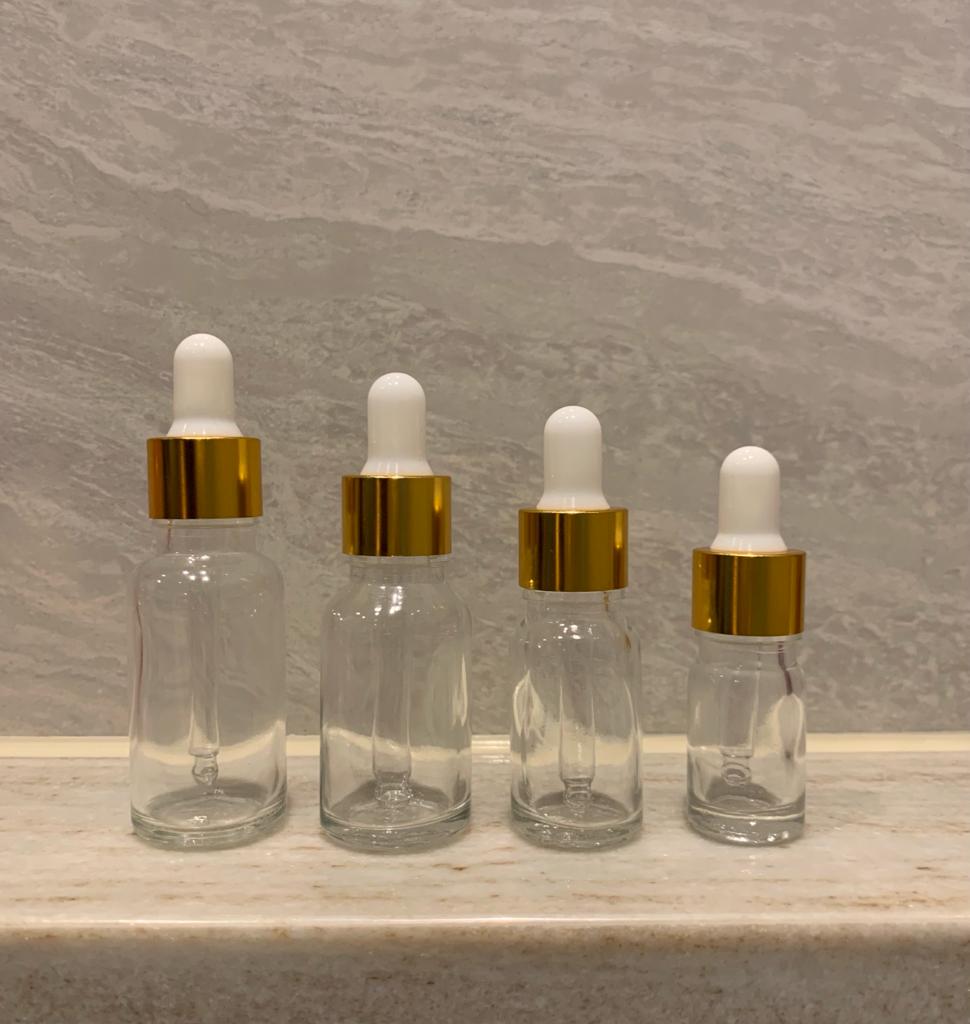 Clear Glass Essential Oil Dropper Bottles in Gold Cap